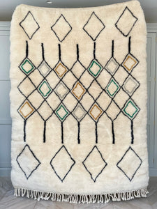 Modern mid century modern makeover Moroccan rug